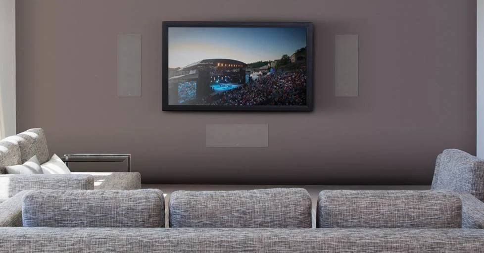 How to Choose Between Hidden In Wall Speakers and Floor Standing Systems